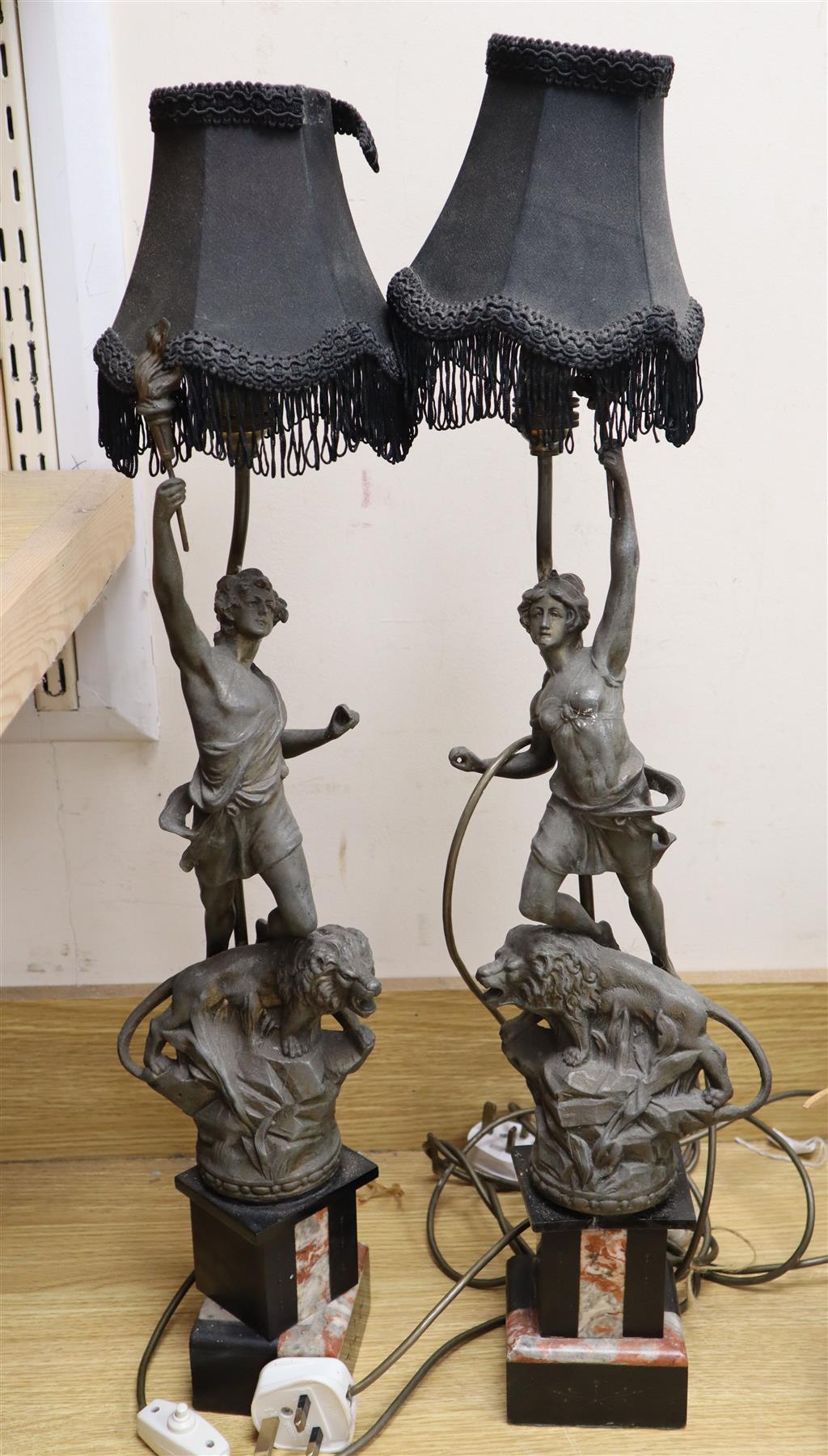 A pair of patinated spelter figural table lamps, 68cm inc. shade